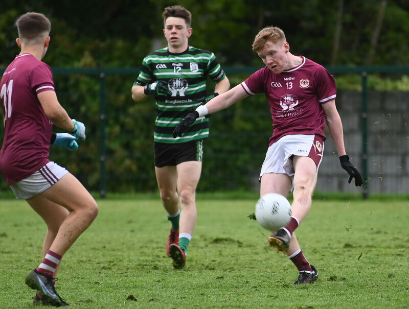 Bishopstown's Jack Tompkins shoots from Douglas' Calvin Kilbride during the Rebel Og premier 1 MFC game at Bishopstown. Picture; Eddie O'Hare Bishopstown's Jack Tompkins shoots from Douglas' Calvin Kilbride during the Rebel Og premier 1 MFC game at Bishopstown. Picture; Eddie O'Hare