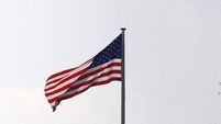 US Green Card holder accused of presenting false passport for teen boy is remanded in custody
