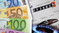 electric meter and Euro banknotes as symbol for high energy costs