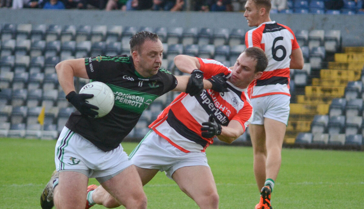 Paul Kerrigan holds off the challenge from Ballincollig's Cian Kiely during the Bon Secours Hospital Cork Premier SFC game at Páirc Uí Rinn. Picture: Howard Crowdy Paul Kerrigan holds off the challenge from Ballincollig's Cian Kiely during the Bon Secours Hospital Cork Premier SFC game at Páirc Uí Rinn. Picture: Howard Crowdy