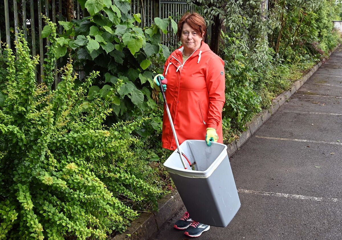 Mary Coomey taking part in Mayfield GAA Club’s community clean-up. 	Picture: Denis Minihane
                    