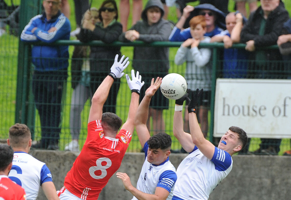 Knocknagree's Mike Mahoney and Timmy O'Connor going high for the ball with Rory Byrne of O'Donovan Rossa. Picture: Denis Minihane. Knocknagree's Mike Mahoney and Timmy O'Connor going high for the ball with Rory Byrne of O'Donovan Rossa. Picture: Denis Minihane.