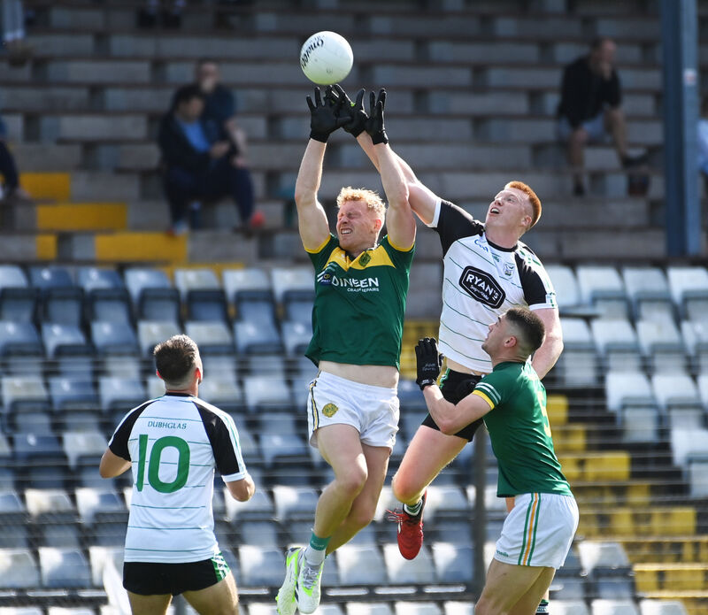 Douglas's Brian Harnett and St Michael's Eoin Hickey go high for the ball during the Bon Secours Hospital Cork Premier SFC game at Páirc Uí Rinn. Picture: Eddie O'Hare