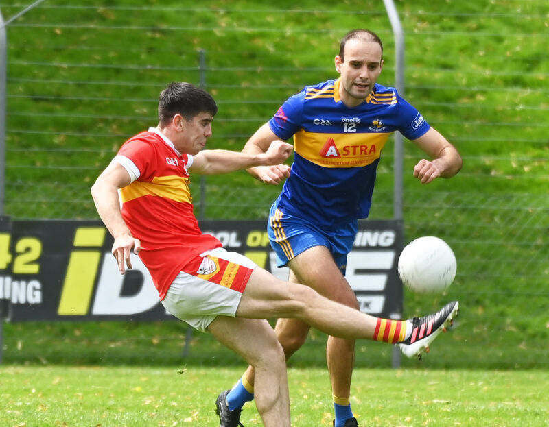  Éire Óg's Eoin O'Shea shoots from Carrigaline's Evan Ryle. Picture: Eddie O'Hare