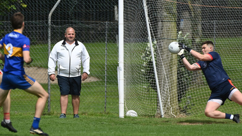Éire Óg edge out Carrigaline thanks to Joe Cooper goal and Chris Kelly's super saves Éire Óg edge out Carrigaline thanks to Joe Cooper goal and Chris Kelly's super saves