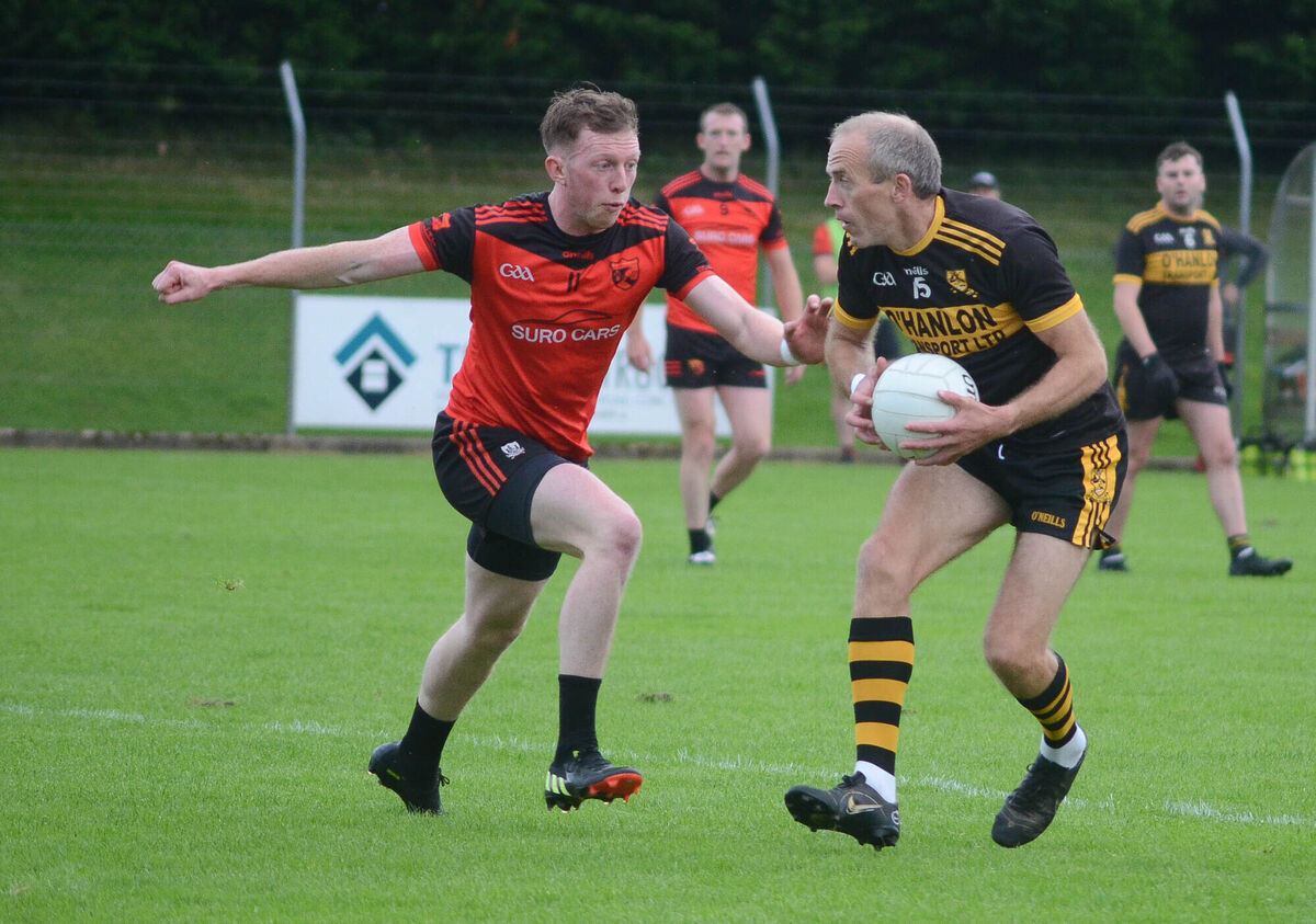Paudie Kissane of Clyda Rovers is challenged by Conchur O'Loingsigh of Beal Atha'n Ghaorthaidh. Picture: Howard Crowdy