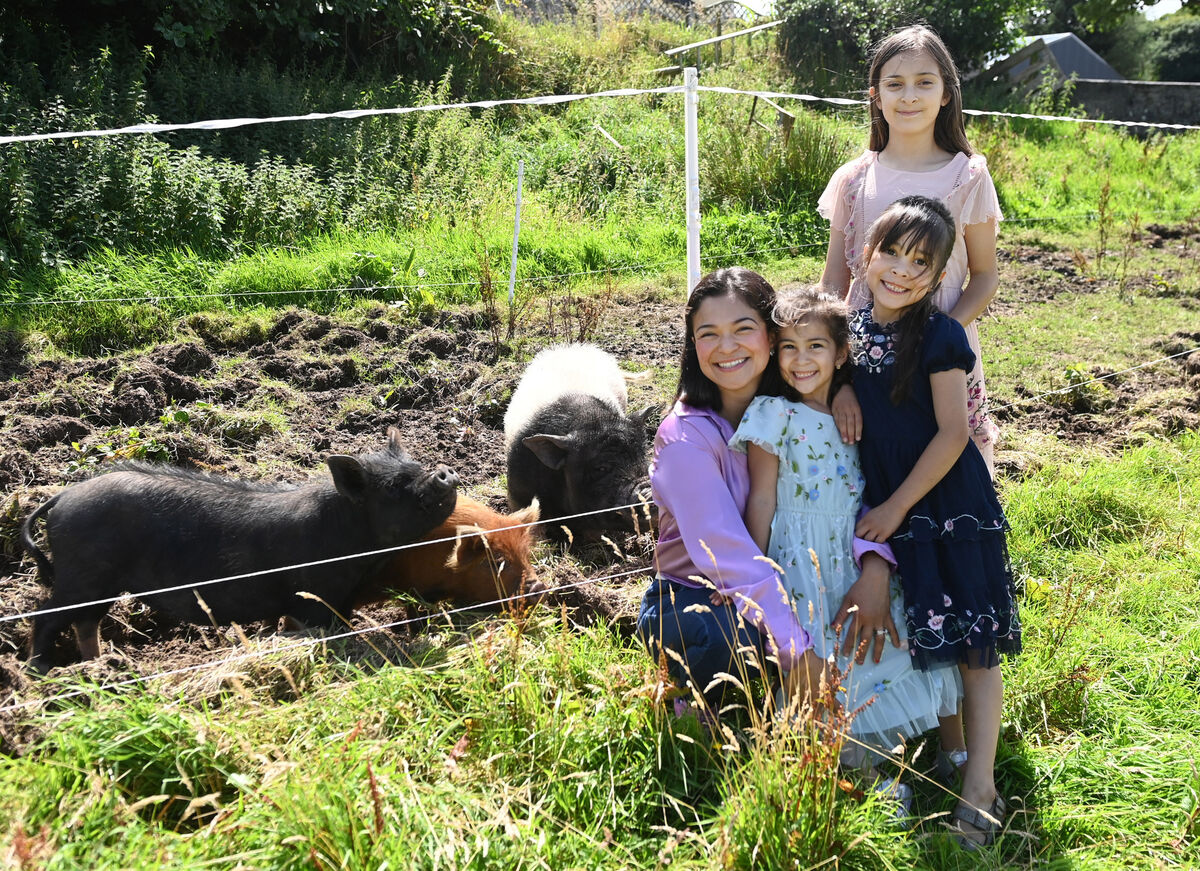 Sonia Kingston Castro with her daughters Isabella, 10, Sofia, 6, and Yaretzi, 5, with pigs at Coolkelure farm and gardens near Dunmanway. Pictures by Eddie O’Hare Sonia Kingston Castro with her daughters Isabella, 10, Sofia, 6, and Yaretzi, 5, with pigs at Coolkelure farm and gardens near Dunmanway. Pictures by Eddie O’Hare