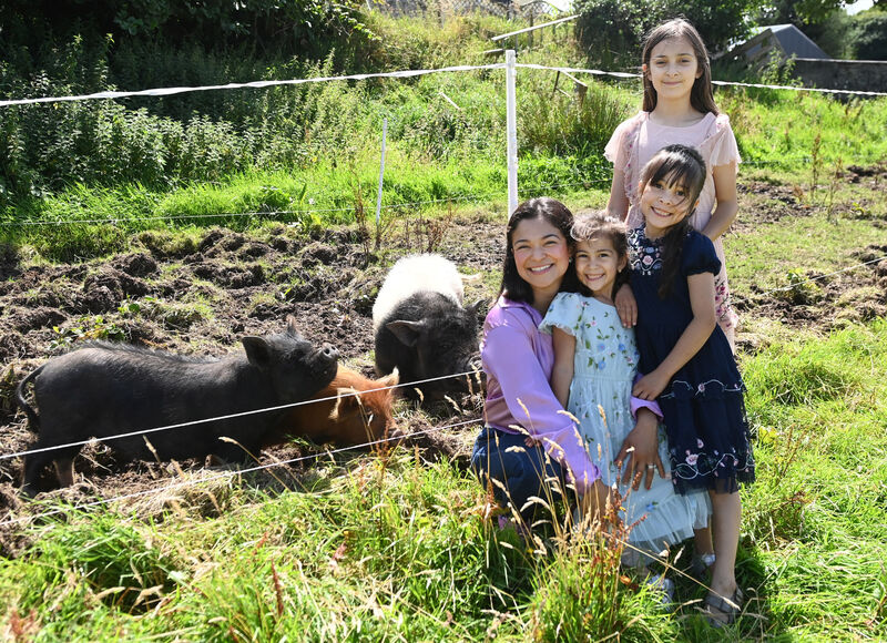 Sonia Kingston Castro with her daughters Isabella, 10, Sofia, 6, and Yaretzi, 5, with pigs at Coolkelure farm and gardens near Dunmanway. Pictures by Eddie O’Hare Sonia Kingston Castro with her daughters Isabella, 10, Sofia, 6, and Yaretzi, 5, with pigs at Coolkelure farm and gardens near Dunmanway. Pictures by Eddie O’Hare