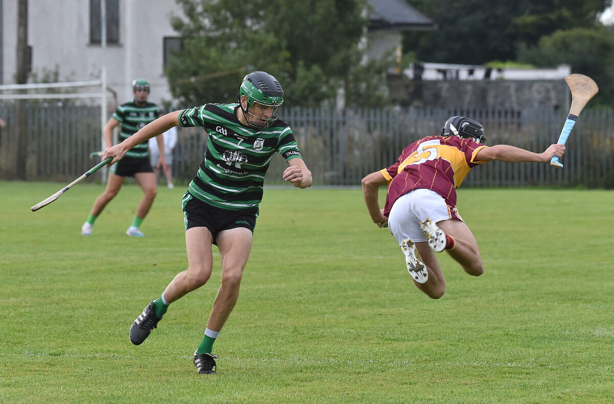 Fionn Hill, Youghal is fouled by Donncha MacPhaidín , Douglas during their P1 minor hurling championship match at Youghal, Co Cork. Picture Dan Linehan Fionn Hill, Youghal is fouled by Donncha MacPhaidín , Douglas during their P1 minor hurling championship match at Youghal, Co Cork. Picture Dan Linehan