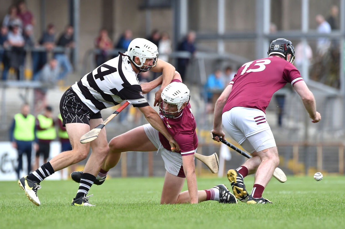 Thomas Murray, Bishopstown. coming away with the sliotar as Luke O'Farrell tackles Barry Murphy. Picture: Dan Linehan Thomas Murray, Bishopstown. coming away with the sliotar as Luke O'Farrell tackles Barry Murphy. Picture: Dan Linehan