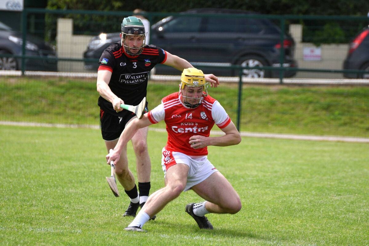 Austin O'Hara of Kilworth pursues Watergrasshill's Séan Desmond. Picture: Catherine Sheehan. Austin O'Hara of Kilworth pursues Watergrasshill's Séan Desmond. Picture: Catherine Sheehan.
