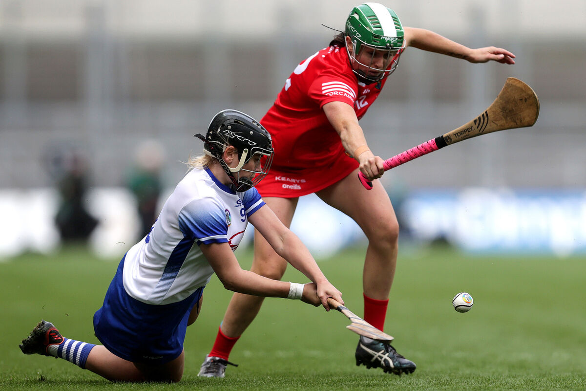 Waterford's Abby Flynn challenges Hannah Looney, who had a powerful game for Cork. Picture: INPHO/Laszlo Geczo