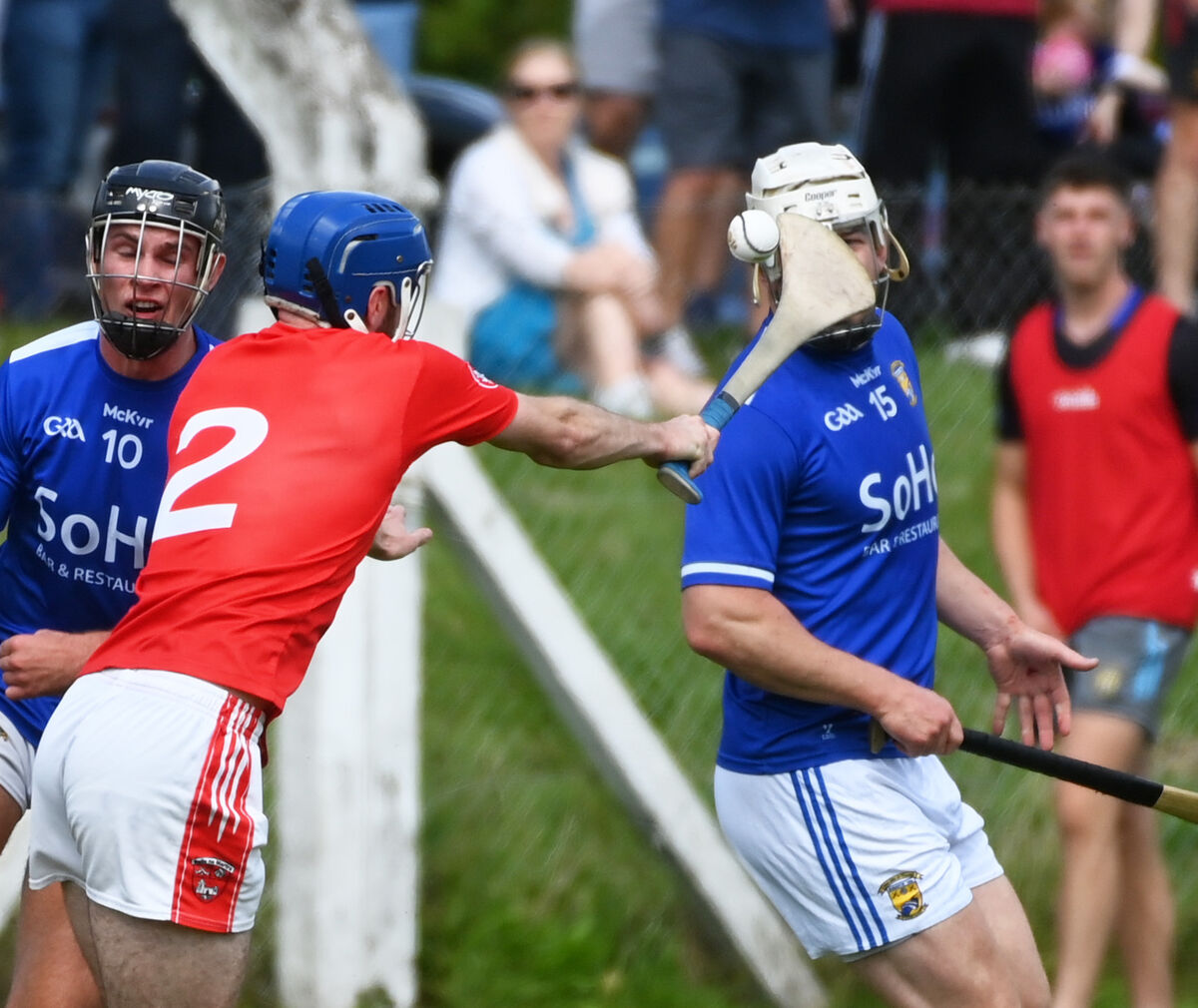 Castlemartyr's Cathal Martin tackles Ballinhassig's Fintan O'Leary. Picture: Eddie O'Hare