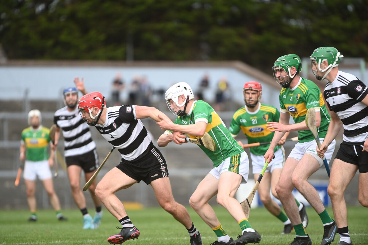 Midleton's Séadnaidh Smyth pulling away from Rory Troy of Newtownshandrum. Picture: Larry Cummins Midleton's Séadnaidh Smyth pulling away from Rory Troy of Newtownshandrum. Picture: Larry Cummins