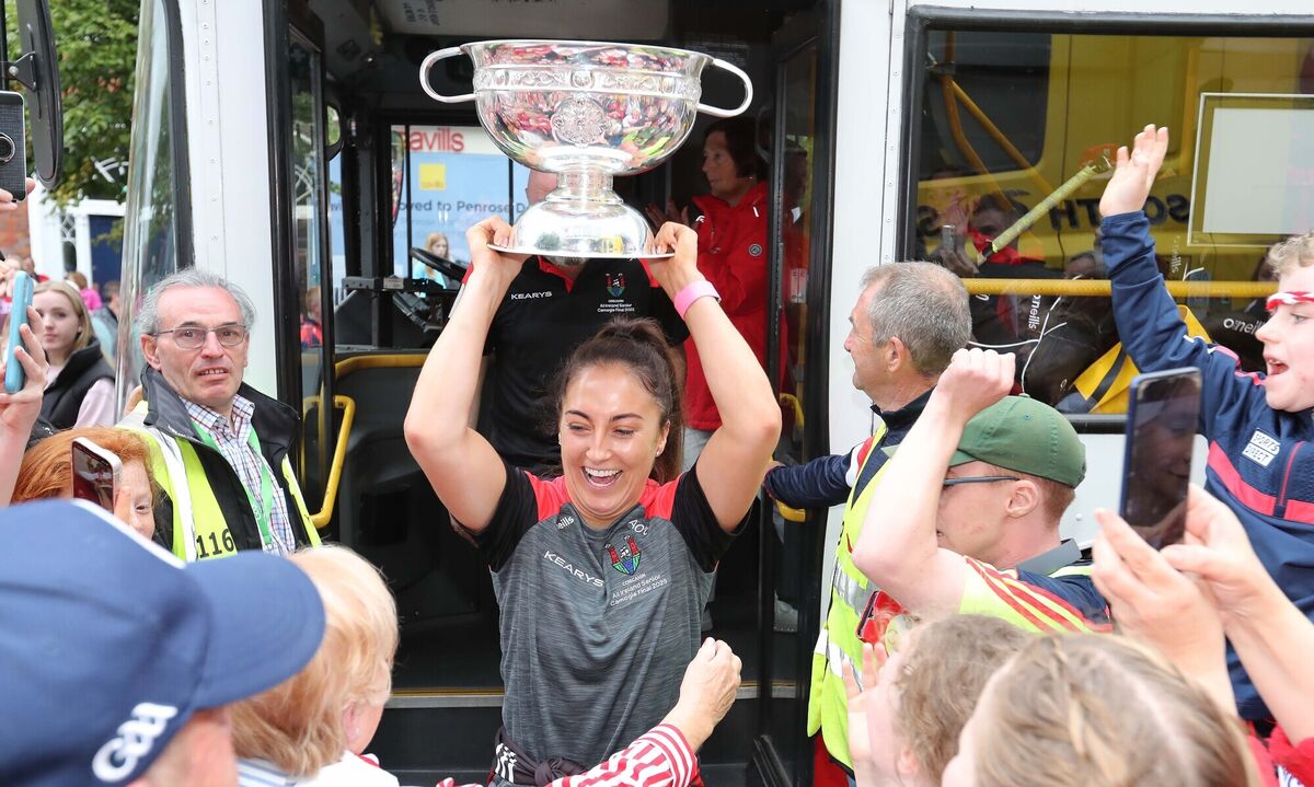 Cork Captain, Amy O'Connor, gets off the Bus with the O'Duffy Cup. Cork Captain, Amy O'Connor, gets off the Bus with the O'Duffy Cup.