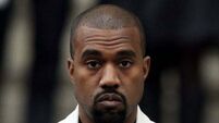 Kanye West makes surprise appearance on stage with Travis Scott in Rome