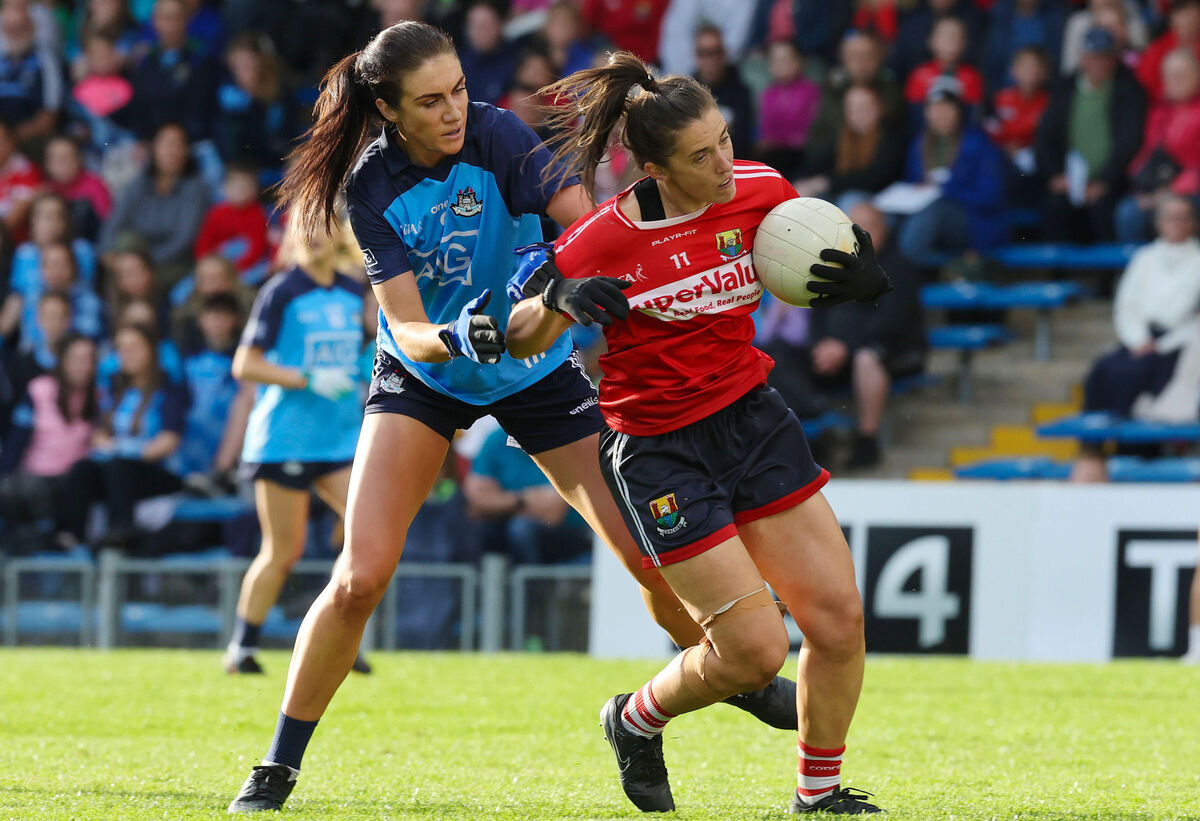 Dublin's Eilish O'Dowd fouls Ciara O'Sullivan of Cork. Picture: INPHO/Lorraine O’Sullivan
