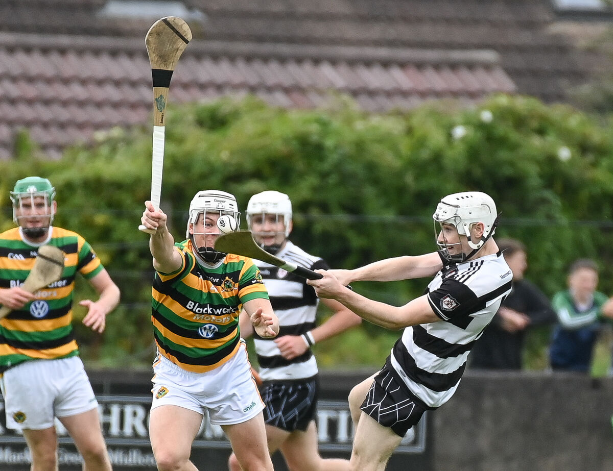  Midleton's Paul Connaughton shoots past Glen Rovers' Adam Lynch. Picture: David Keane.