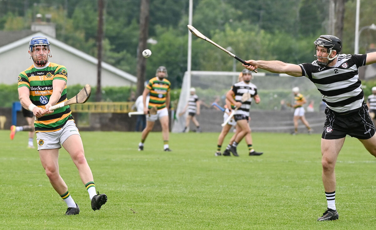  Glen Rovers' Stephen Lynam scores a point as Midleton's Sean O'Sullivan closes in, during their Premier SHC clash at Carrigtwohill. Picture: David Keane.