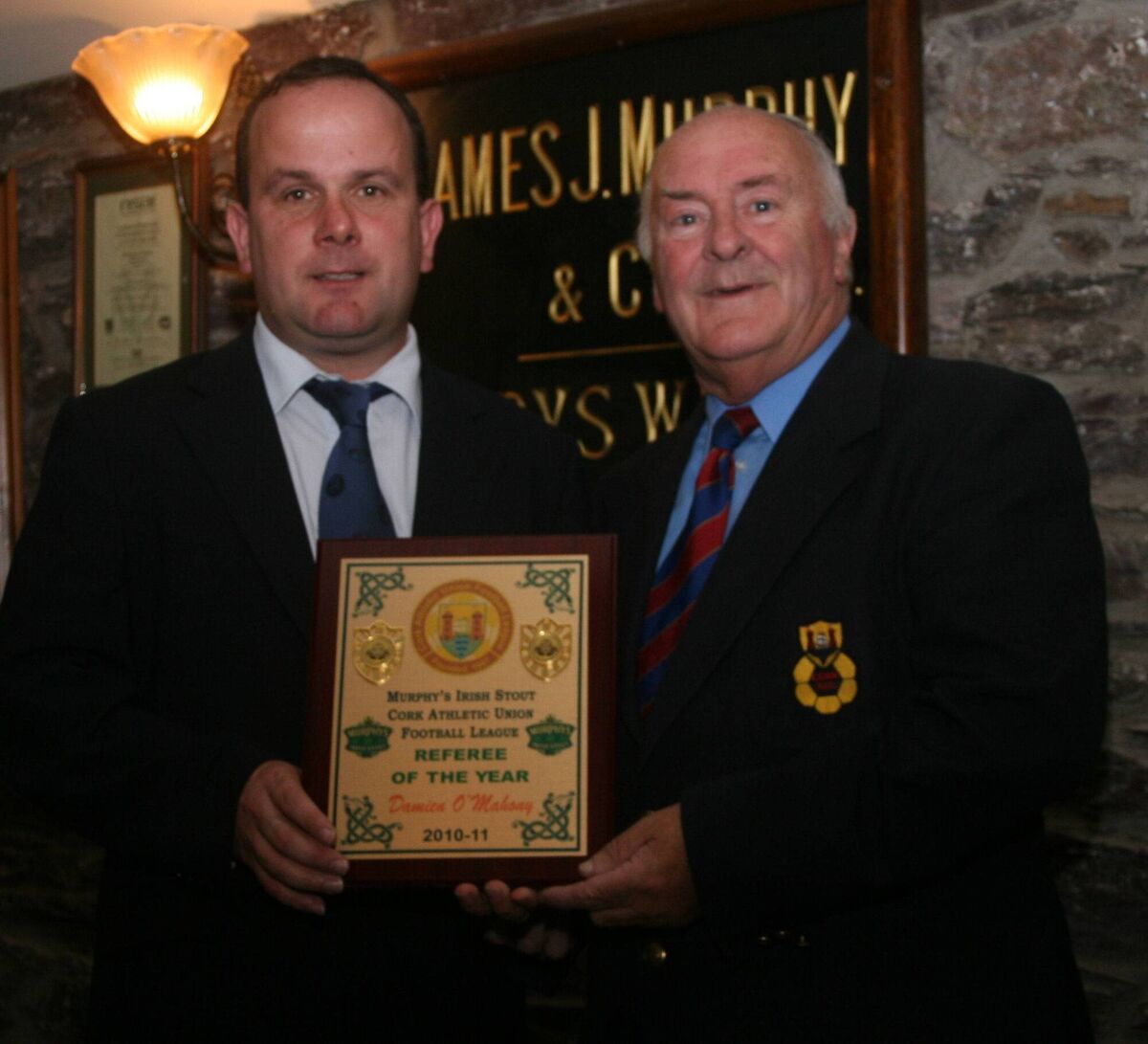 Damien O'Mahony receives the 2010-'11 AUL Referee of the Year Award from Fixture Secretary Ted O'Mahony. Damien was the first to receive the award from the Cork AUL and the Business League. Picture: Finbarr Buckley Damien O'Mahony receives the 2010-'11 AUL Referee of the Year Award from Fixture Secretary Ted O'Mahony. Damien was the first to receive the award from the Cork AUL and the Business League. Picture: Finbarr Buckley