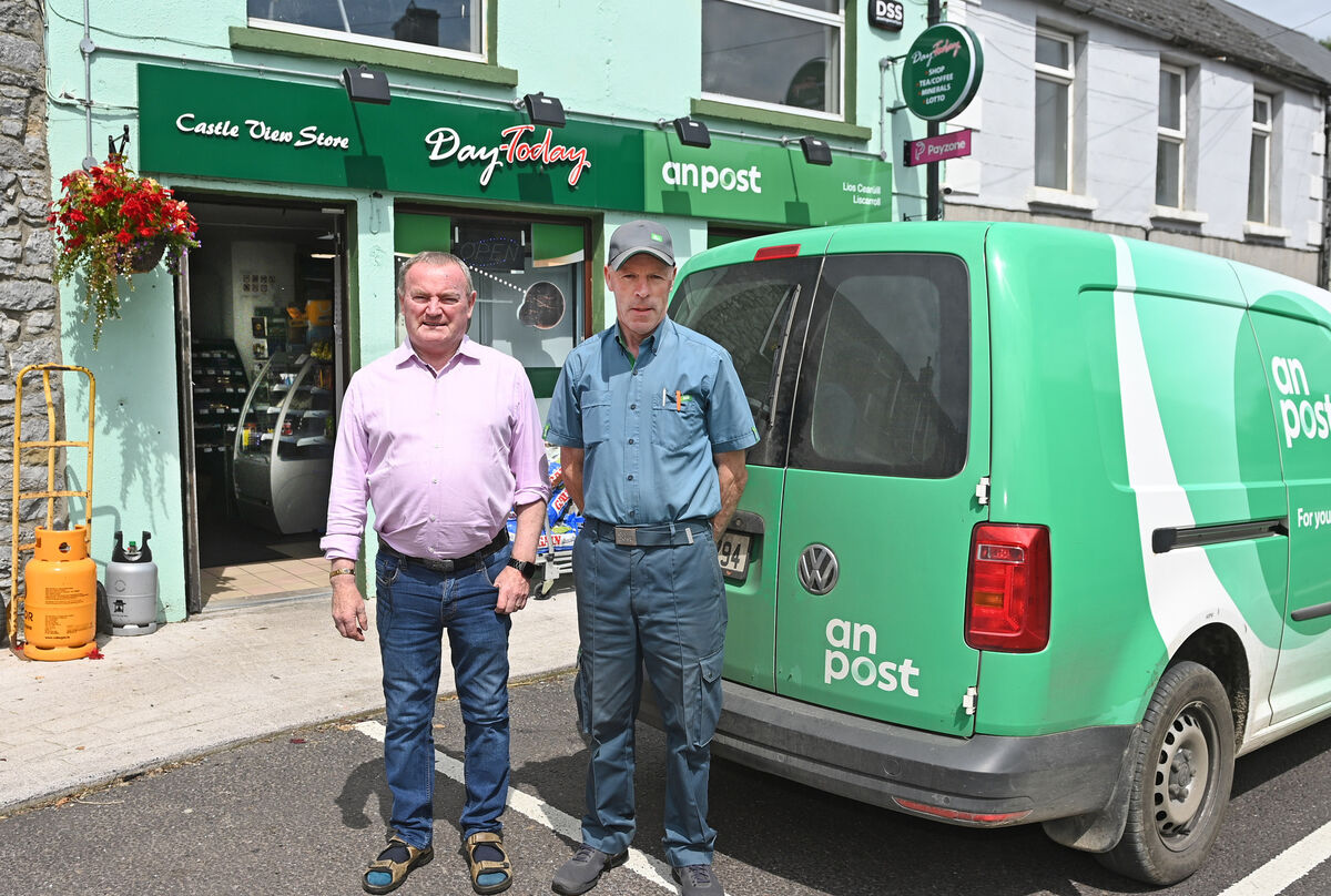 ed Burke, postmaster and Dan O'Brien,postman at Liscarroll post office . Picture; Eddie O'Hare ed Burke, postmaster and Dan O'Brien,postman at Liscarroll post office . Picture; Eddie O'Hare