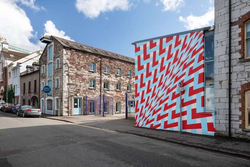 Deirdre Breen's visual illusion mural at Wandesford Quay is an appreciated form of street art that enhances public spaces, unlike graffiti. Picture: Jed Niezgoda