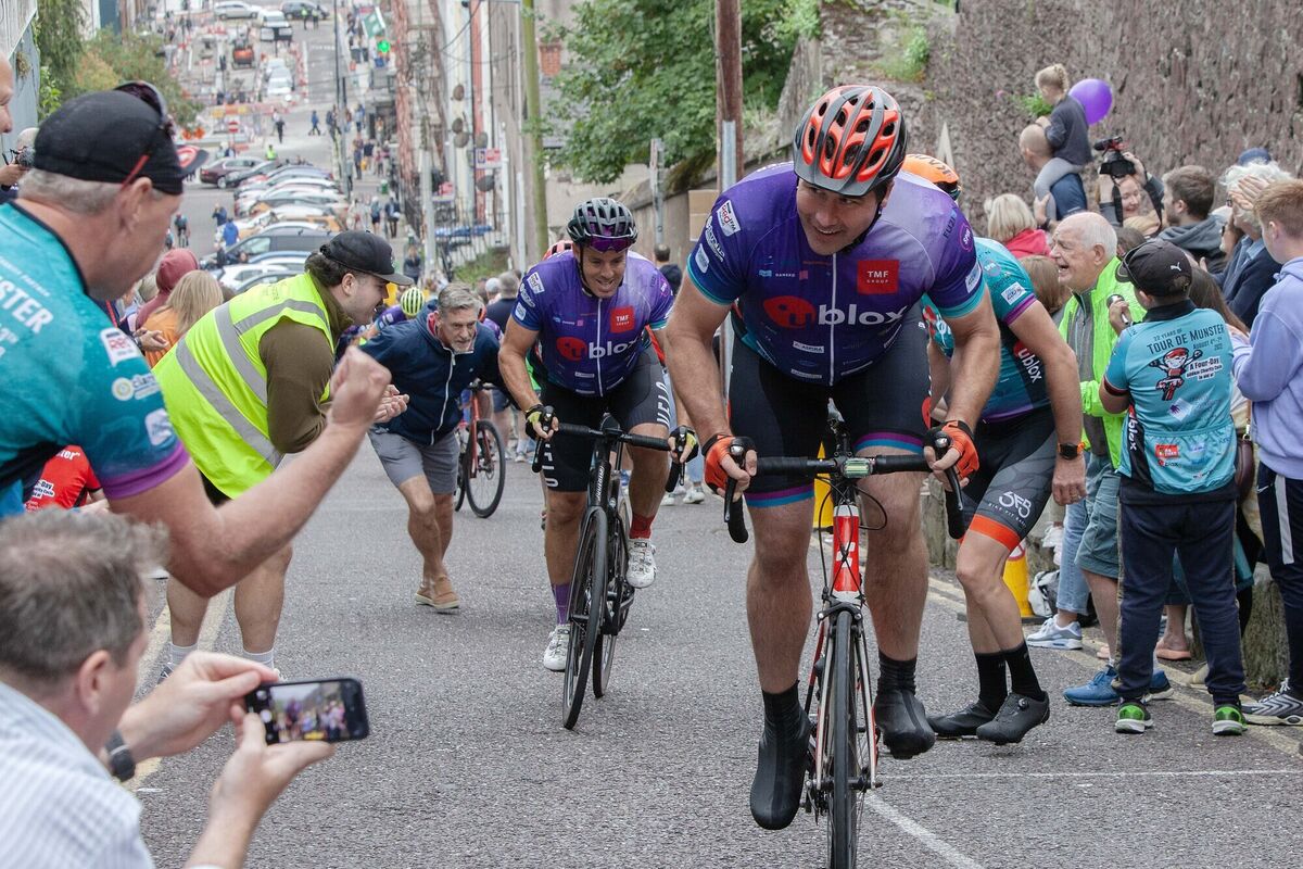 A cyclist is encouraged at the end of the 2023 Tour de Munster Charity Cycle on Patrick's Hill. Pic Diane Cusack