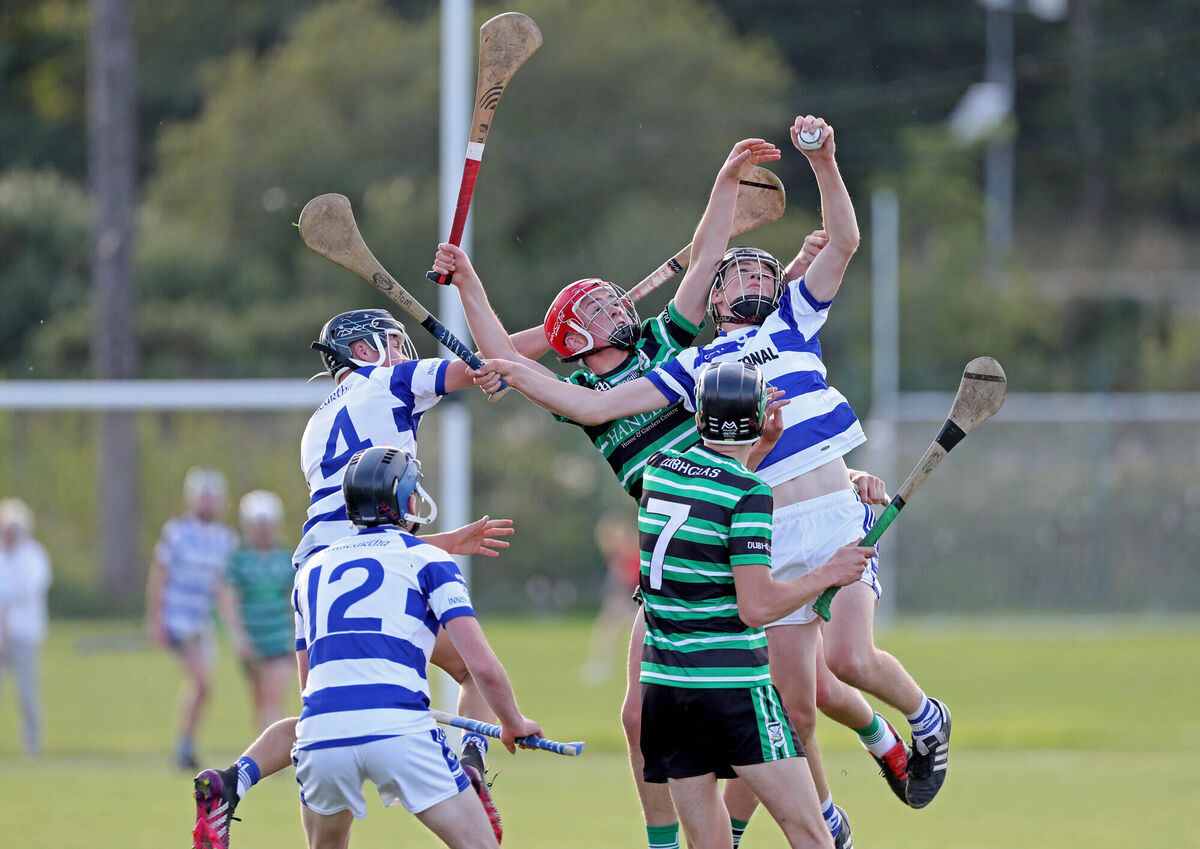  Tom Lucas, Douglas with Donncha MacPhaidin, battles for the high ball with Jack O'Mahony, Inniscarra, supported by Sean Murphy and Ryan Murphy.   2023 Rebel Og, Premier 1 Minor Hurling Championship, Douglas V's Inniscarra, at Douglas Gaa, Cork.