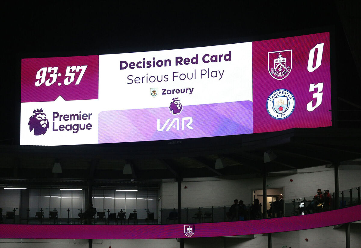 A VAR decision for a red card to Burnley's Anass Zaroury on the scoreboard during the Premier League match at Turf Moor, Last Friday. Picture: Nigel French/PA Wire.