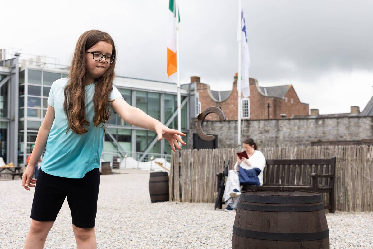 Throwing horse shoes in King John's Castle.