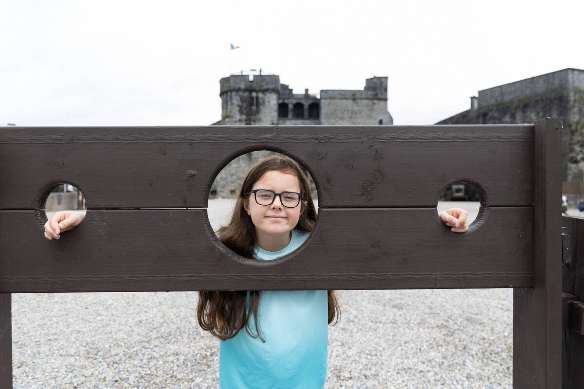 Sadhbh Kane in the stocks at King John's Castle.