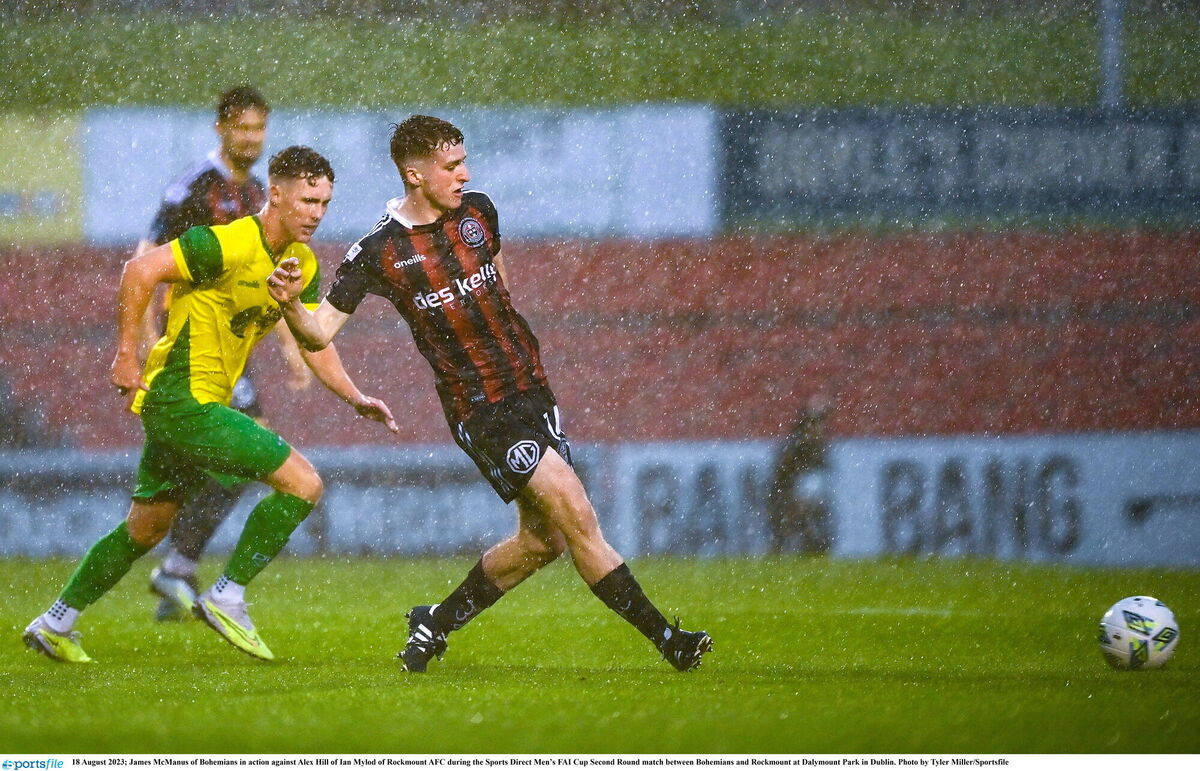 James McManus of Bohemians in action against Alex Hill of Ian Mylod of Rockmount AFC at Dalymount Park. Picture: Tyler Miller/Sportsfile James McManus of Bohemians in action against Alex Hill of Ian Mylod of Rockmount AFC at Dalymount Park. Picture: Tyler Miller/Sportsfile