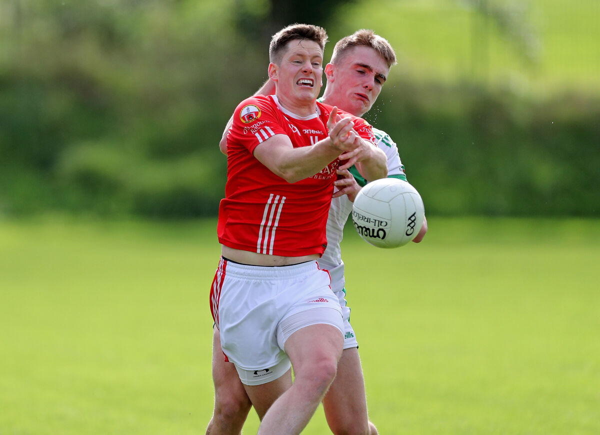 Tommy Walsh, Kanturk, tackles Donal Óg Hodnett, O'Donovan Rossa. Picture: Jim Coughlan. Tommy Walsh, Kanturk, tackles Donal Óg Hodnett, O'Donovan Rossa. Picture: Jim Coughlan.