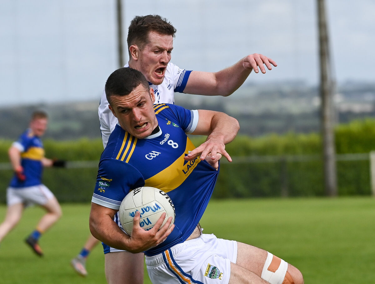Kilshannig's Jack Twomey keeps possession as Cill Na Martra's Maidhci Ó Duinnin closes in, during their Premier IFC clash at Donoughmore. Picture: David Keane. Kilshannig's Jack Twomey keeps possession as Cill Na Martra's Maidhci Ó Duinnin closes in, during their Premier IFC clash at Donoughmore. Picture: David Keane.