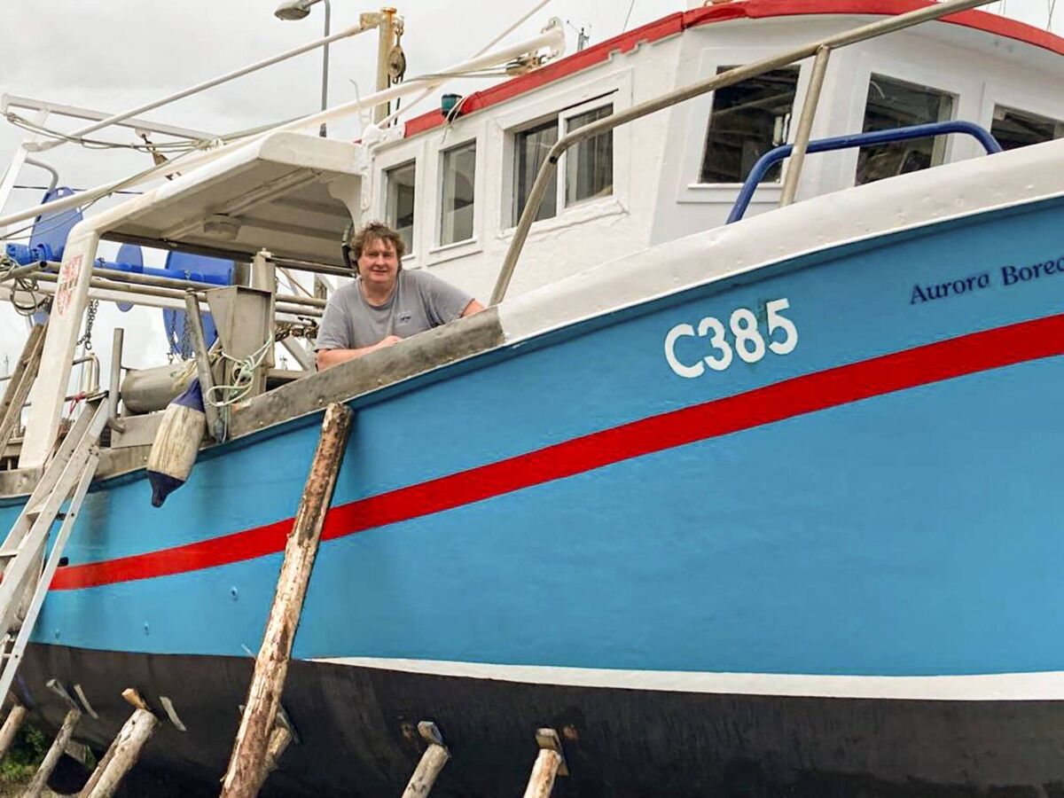 Shane Murphy and his old vessel, Aurora Borealis. Shane Murphy and his old vessel, Aurora Borealis.
