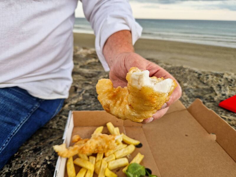 The perfect marriage of fish and chips at the beach. Picture: Richard Gordon.