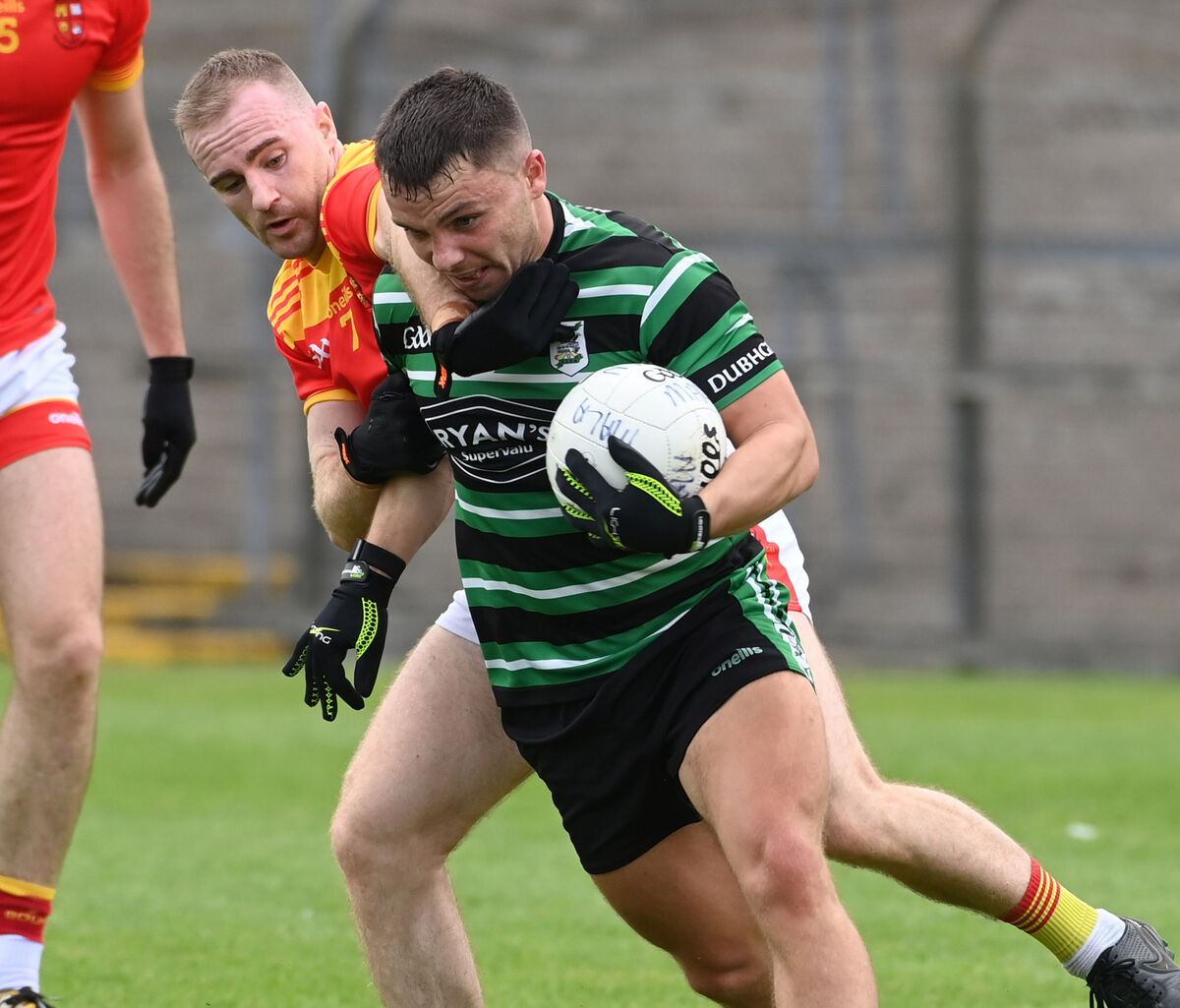 Douglas' Sean Powter is tackled by Mallow's Mattie Taylor. Picture: Eddie O'Hare