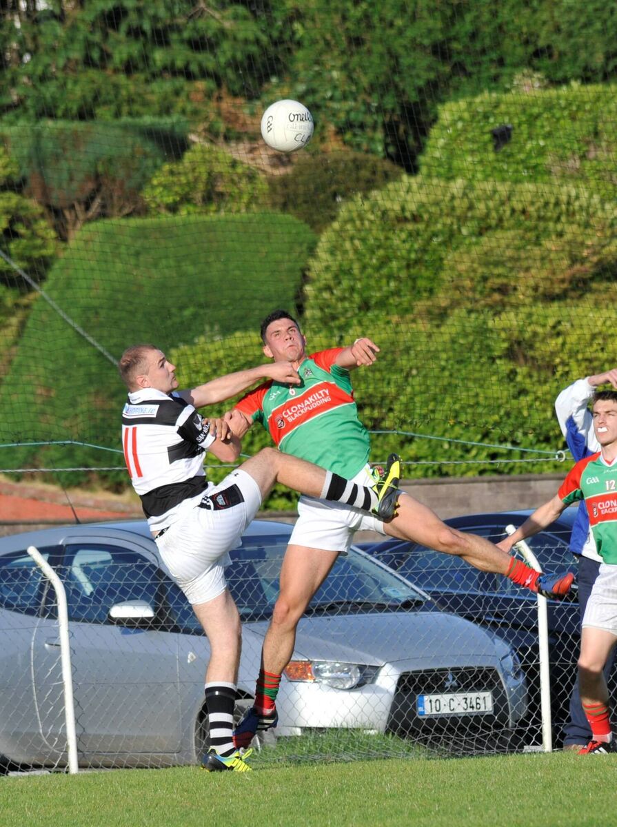 Clonakilty's, Thomas Clancy and St Nick's Dean Brosnan jump for the ball in the SFC game in Bandon back in 2015. Brosnan is still going strong. Picture: Gavin Browne