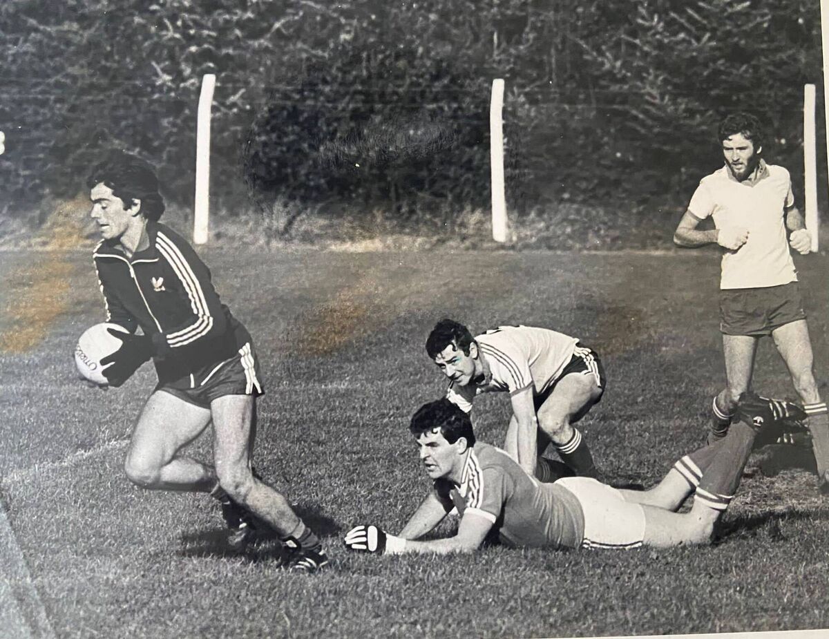 Passage goalkeeper Thomas Harrington comes away with the ball against O'Donovan Rossa, closely watched by defenders Bernie Meade and Kieran Keane. Passage goalkeeper Thomas Harrington comes away with the ball against O'Donovan Rossa, closely watched by defenders Bernie Meade and Kieran Keane.