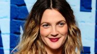 Drew Barrymore escorted backstage at New York event after fan moves towards her