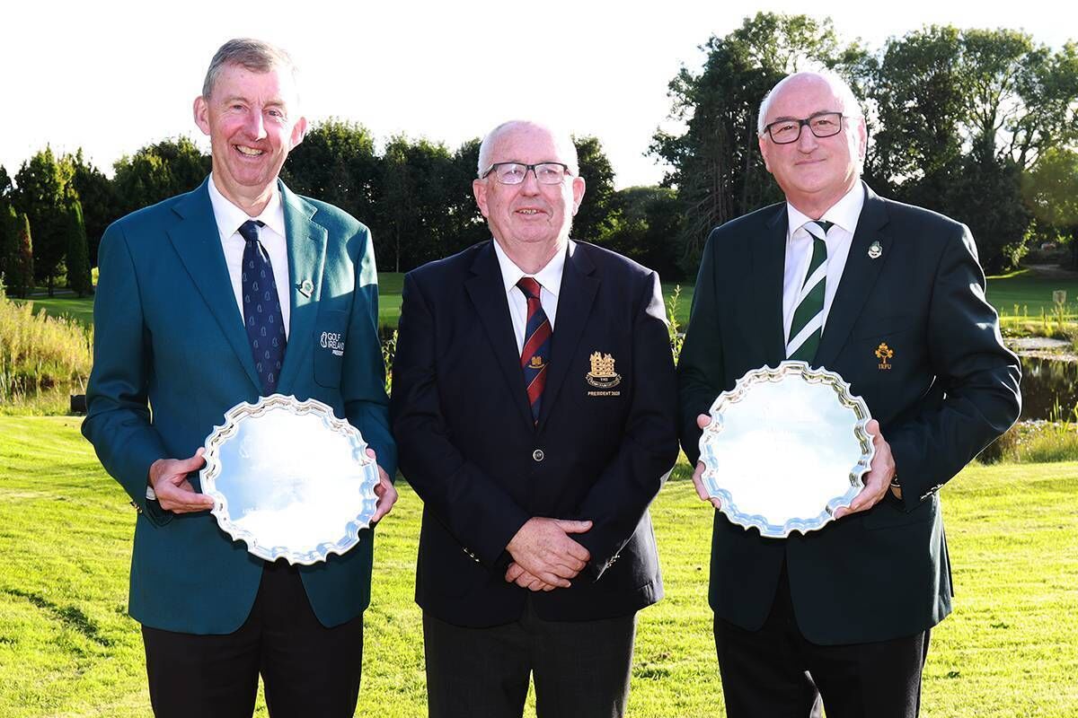 Jim Long, President Golf Ireland and Greg Barrett, President IRFU pictured with Monkstown President Martin Walsh after they received a presentation from the club. Picture: Niall O'Shea