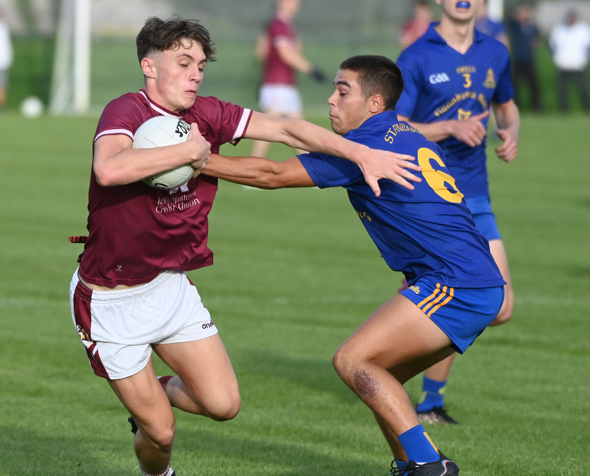 Bishopstown's Gary Holland is tackled by St Finbarr's Matthew Aherne. Picture: Eddie O'Hare Bishopstown's Gary Holland is tackled by St Finbarr's Matthew Aherne. Picture: Eddie O'Hare