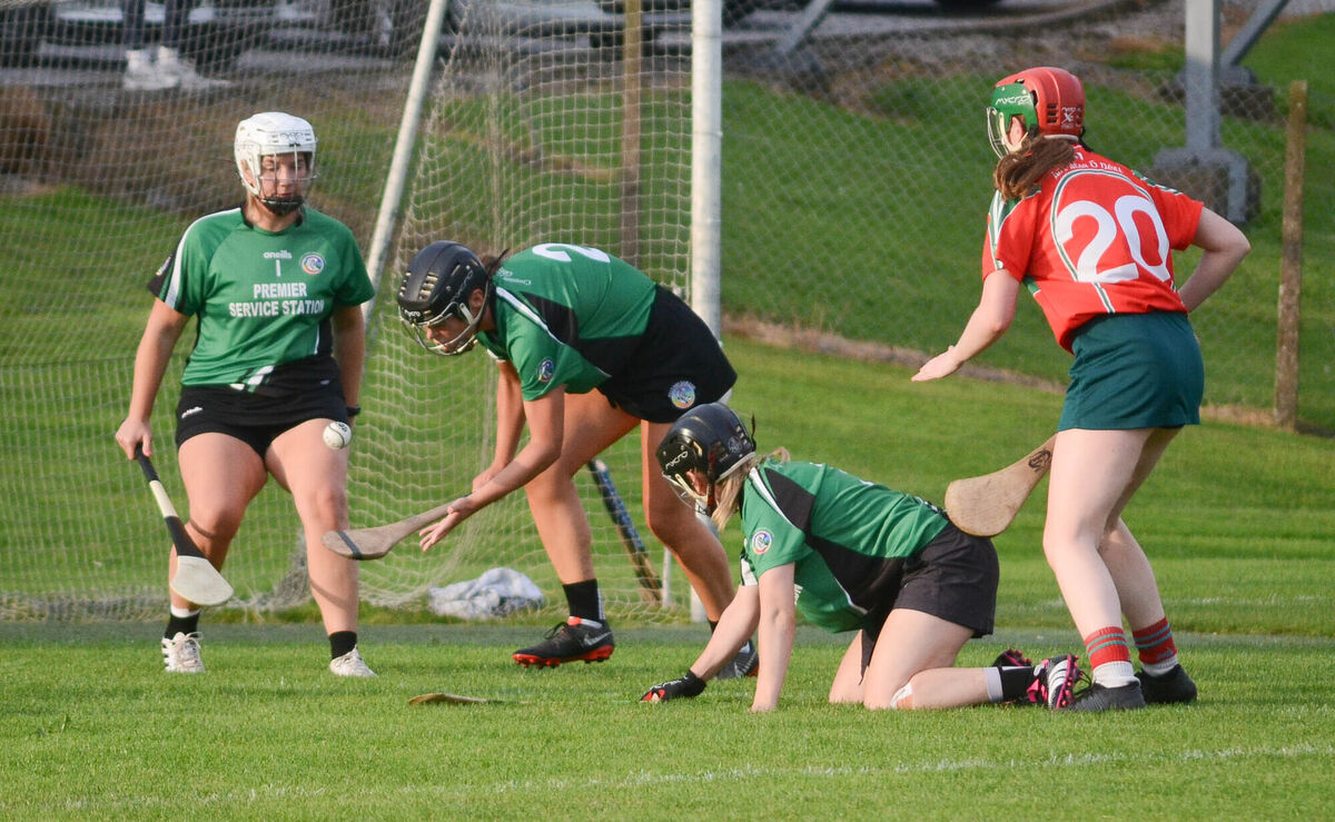 Killeagh's Emma Treacy drives out past Fr O'Neills Sarah Kate Dorgan. Picture: Howard Crowdy Killeagh's Emma Treacy drives out past Fr O'Neills Sarah Kate Dorgan. Picture: Howard Crowdy