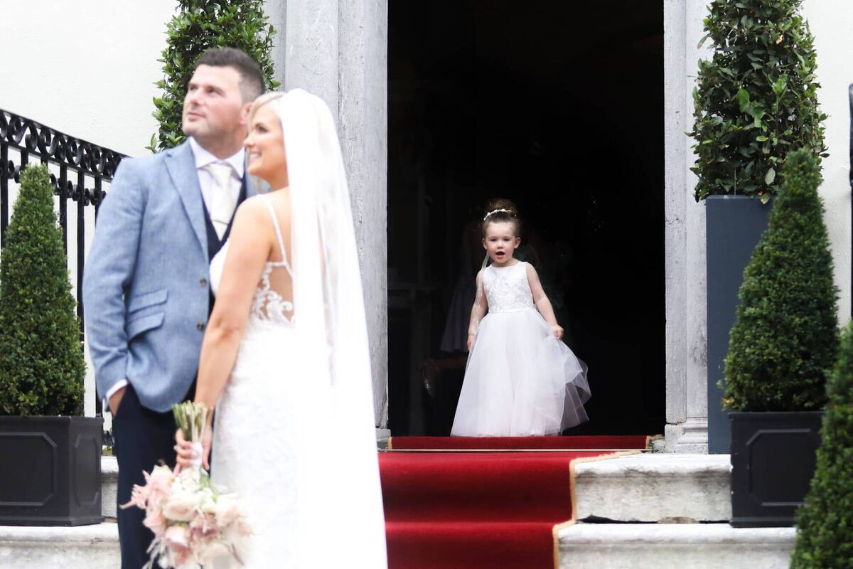 Karen and Gavin with daughter Ava in the background. Karen and Gavin with daughter Ava in the background.