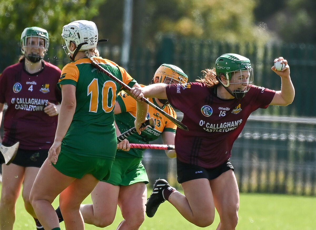 Enniskeane's Daire O'Brien drives past Cloughduv's Lisa Lynch and Mairead Corkery. Picture: David Keane. Enniskeane's Daire O'Brien drives past Cloughduv's Lisa Lynch and Mairead Corkery. Picture: David Keane.