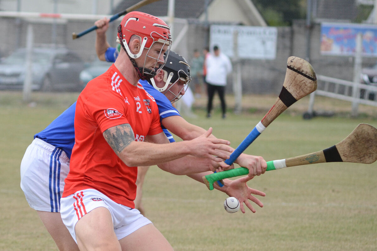 Ballinhassig's Charlie Grainger and Castlemartyr's Barry Lawton reach out for the sliotar during their PIHC match. Picture: Howard Crowdy Ballinhassig's Charlie Grainger and Castlemartyr's Barry Lawton reach out for the sliotar during their PIHC match. Picture: Howard Crowdy