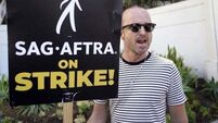 Aaron Paul says higher-ups at Hollywood studios need to ‘come back to reality’
