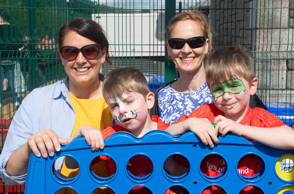 Enjoying the sunshine and a game of Connect 4 at the Crann Centre Family Fun Day were Daithi and Seimi Murphy with Caroline and Maria Murphy from Ballincollig. Picture: Howard Crowdy Enjoying the sunshine and a game of Connect 4 at the Crann Centre Family Fun Day were Daithi and Seimi Murphy with Caroline and Maria Murphy from Ballincollig. Picture: Howard Crowdy