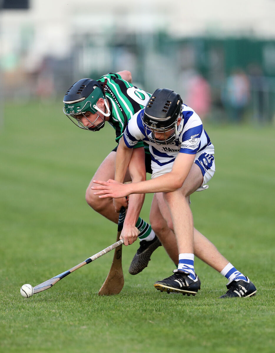  Jack O'Brien, Douglas, battles Jack O'Mahony, Inniscarra, in the Rebel Óg Premier 1 Minor Hurling Championship. Picture: Jim Coughlan.