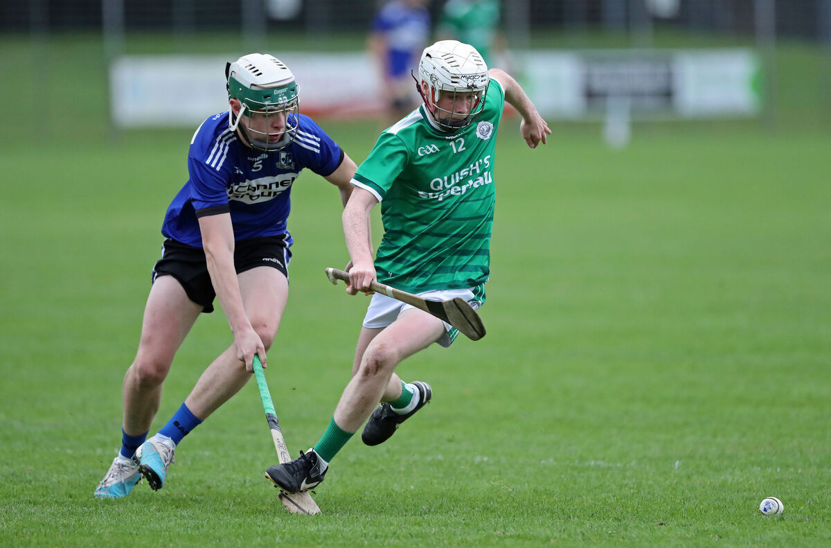  Jack Murray, Ballincollig, races onto the sliotar from Josh McMahon, Sarsfields. Picture: Jim Coughlan.